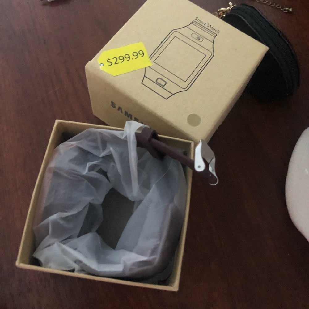 Samsung smart watch new in the box, never worn